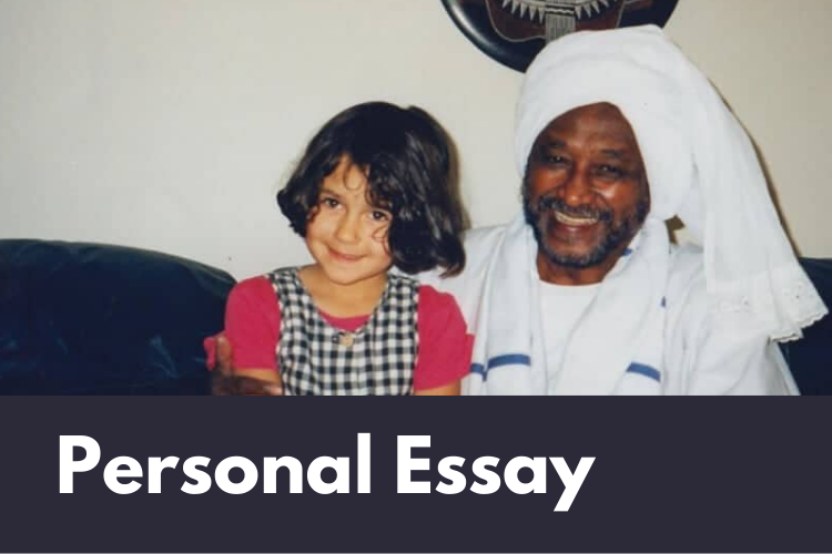 Rushaa as a young girl with her Sudanese grandfather who is wearing traditional robes. Tagged as "Personal Essay"
